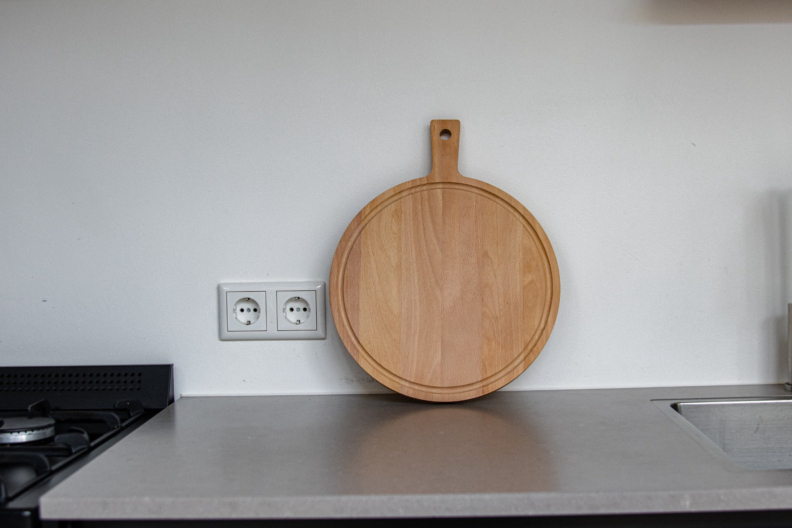Borrelplank - rond beuken - met handvat – Ø 31 cm